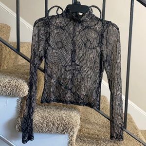 Sheer Snake skin print blouse.